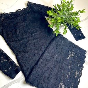 Divided black midi dress